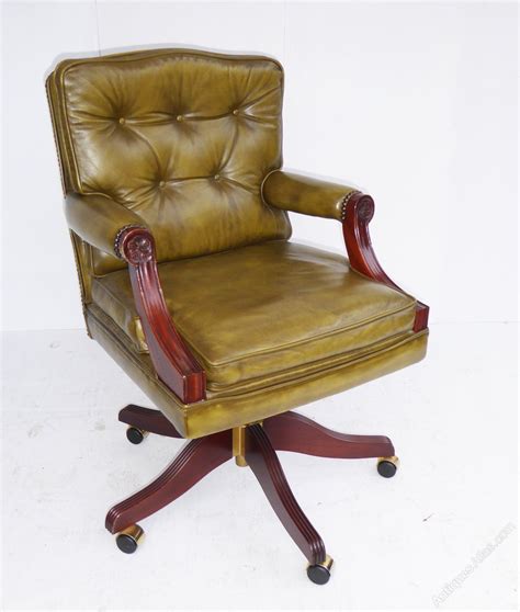 For the past 20 years we have been involved in the antiques business in london. Antiques Atlas - Green Leather Desk Chair