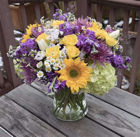 This, to them, is the real first step towards them having a family. Baby shower flower arrangement with yellow spray roses ...