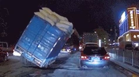 Viral Video Shows A Car Almost Crushed By Falling Lorry Travel News Travel Uk