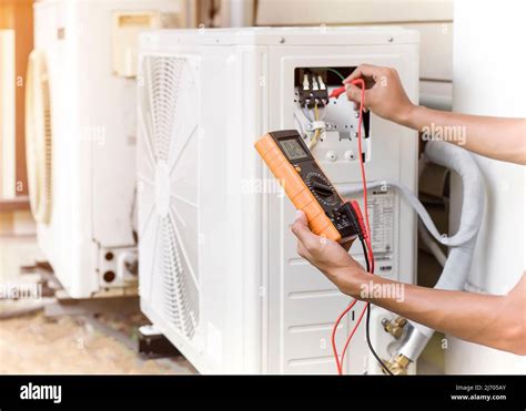 Technician Checking Air Conditioning Operation Detecting Refrigerant