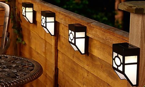 Two Solar-Powered Fence Lights | Groupon
