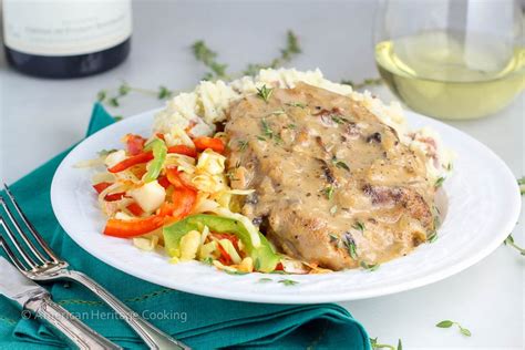 After the pork chops have baked for an hour, cover them with the soup. Baked Mushroom Pork Chops - American Heritage Cooking