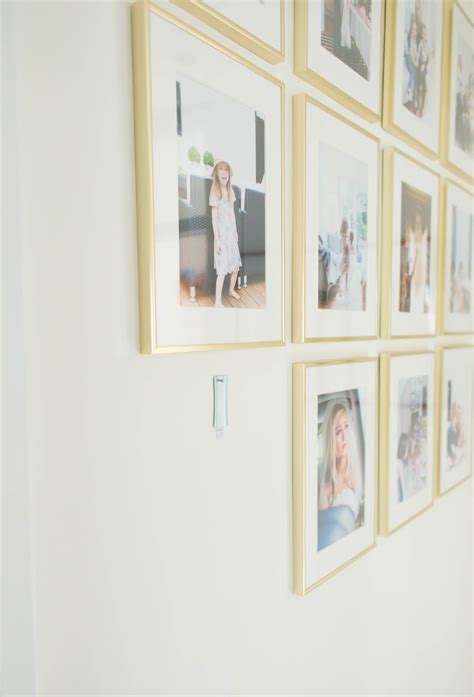 NEW SYMMETRICAL GALLERY WALL WITHOUT NAILS - Finnterior Designer | Gallery wall, Frames on wall ...