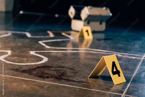 Chalk Outline Blood Stain Investigation Kit And Evidence Markers At