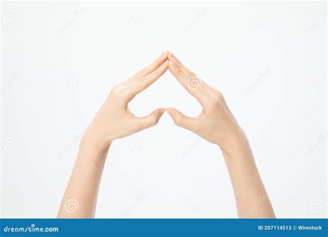 Closeup Shot Of Hands Showing A Heart Upside Down Isolated On A White
