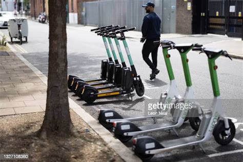 Electric Scooter Parking Photos And Premium High Res Pictures Getty