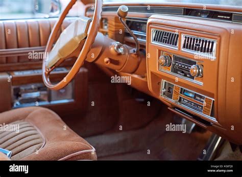 Interior Of A Classic Vintage Car With Column Steering And Wood Trim