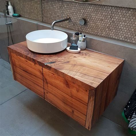 If you have a small bathroom, consider a glass or white vanity. Floating Waterfall End Vanity Unit | Timber vanity, Vanity ...