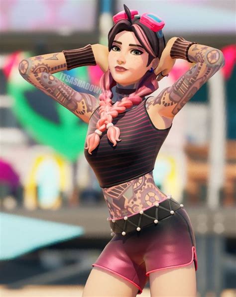 A Woman With Tattoos On Her Arms And Legs