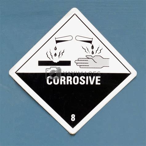 Corrosive hazard symbol warning sign on blue by PiLens Vectors