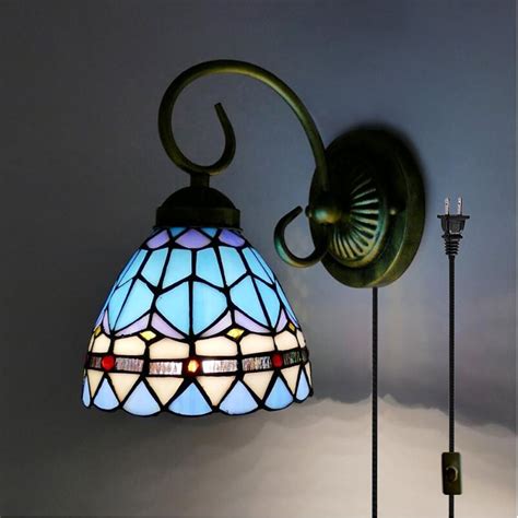 Enhance the look and feel of your room with the help of a new lamp. Kiven Tiffany wall lamp E26 1-Light Plug-In bulb not included Wall Sconce glass Shade 6 Foot ...
