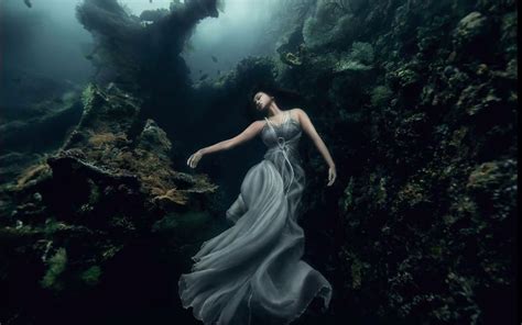 Models Dive 25 Meters To An Underwater Shipwreck In Bali For A