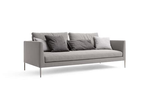 Various styles of armrest and of carcass widths and a choice of cushion fillings give birth to a wide range of design solutions. Pilotis Sofa: COR