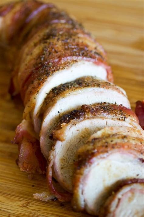 Place tenderloin on prepared baking sheet and brush with remaining 2 tablespoons oil and season with salt and pepper. Roasted Bacon Wrapped Pork Tenderloin