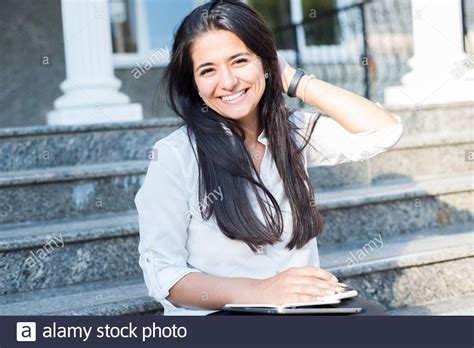 Portrait Of A Beautiful Young Indian Girl Business Woman In A White