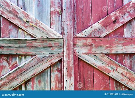 Rough Textures Closeup Of Barn Door With Peeling Paint Stock Photo