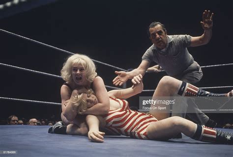 Women Wrestle While A Referee Makes The Countdown Circa 1970s News