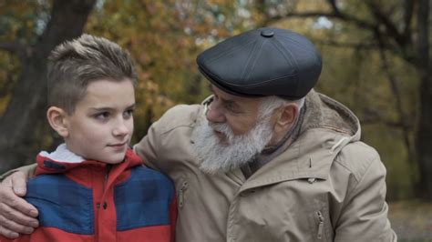 Grandfather Talks With Grandson And Embraces Him Stock Video Footage 00