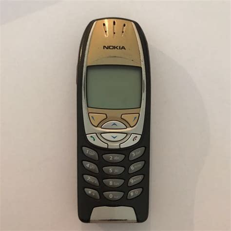 Old School Nokia Phone Gold And Silver Collectors Item Mobile