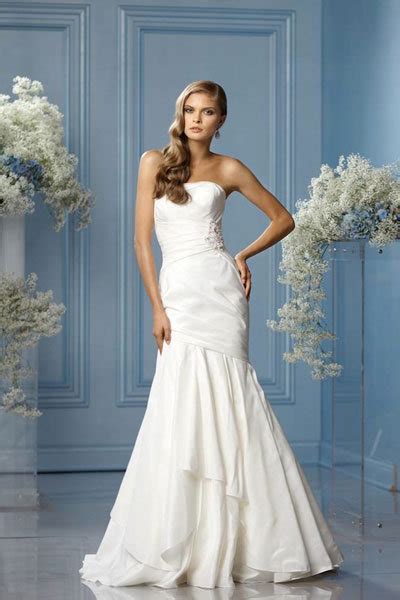 Maybe you would like to learn more about one of these? 30 Wedding Gowns Under $1,000 | BridalGuide