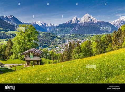 Idyllic Mountain Scenery With Traditional Mountain Chalet In The Alps