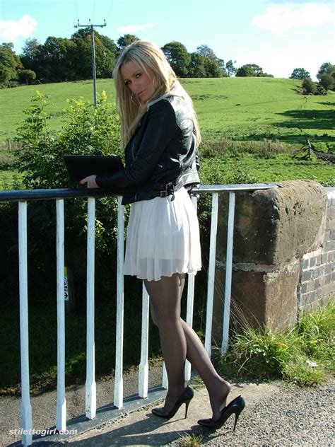 legs in heels and stockings pic 2 of gorgeous blonde erin is outdoors showing off her shiny