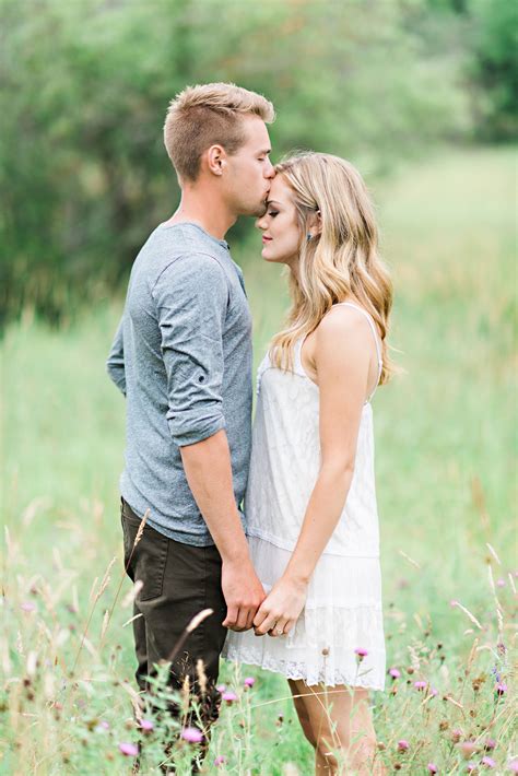 Blonde Couple In Field On Their Whimsical Outdoor Engagement Shoot Blonde Couple Couple