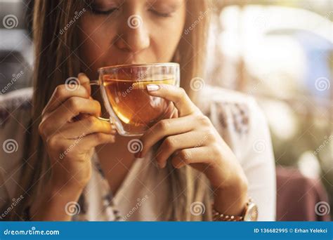 Drink Tea Relax Cosy Photo With Blurred Background Female Hands Holding Mug Of Hot Tea In