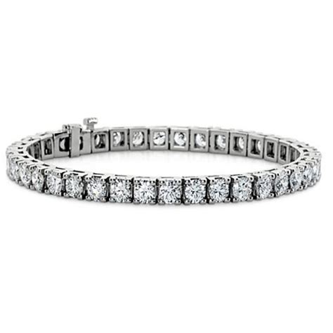 Flash your brilliant style with an infinitely wearable classic! 5.00 ct Ladies Round Cut Diamond Tennis Bracelet in 14 kt White Gold