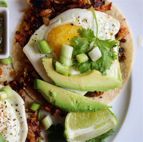 awesome chorizo breakfast tacos with potato hash and fried eggs the 2 spoons