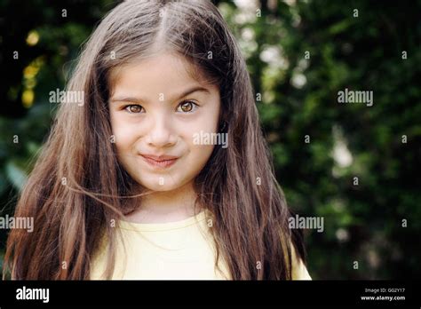Little Girl Raising Her Eyebrow Stock Photo Alamy