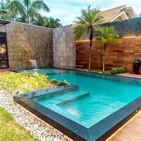 The house was a project developed by studio afgh. Small Backyard Pool Design Ideas That Inspire You | Q-HOUSE