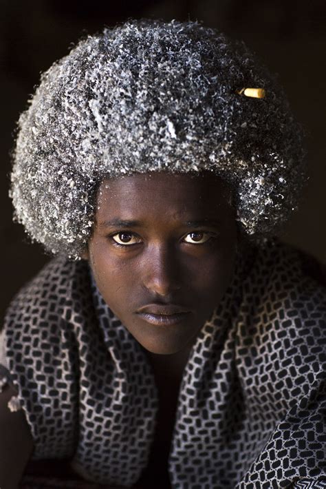 Lowest commission in the industry guaranteed. Afar man with butter in his hair, Ethiopia | © Eric ...