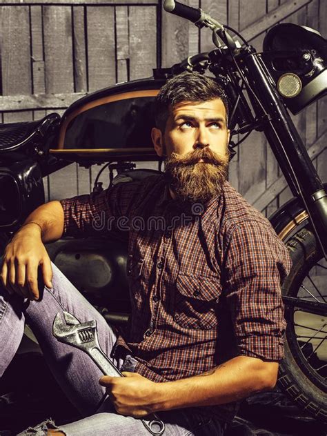 Bearded Biker Man With Wrench Stock Image Image Of Jacket Biker
