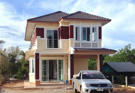 Two Storey Simple Yet Modern Style House That Is Close To