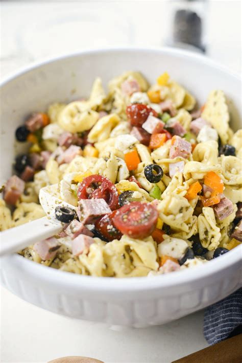 Everyone goes crazy over this antipasto tortellini pasta salad! Antipasto Tortellini Pasta Salad with Basil Pesto ...