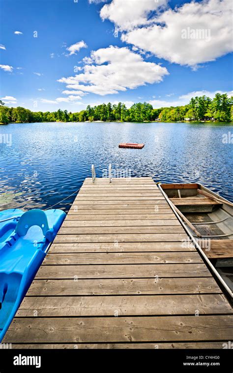Wooden Dock On Beautiful Summer Lake In Ontario Canada Stock Photo Alamy