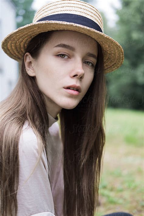 Portrait Of A Beautiful Young Girl In A Hat By Stocksy Contributor
