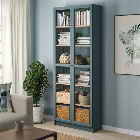 Collection by barbara henry • last updated 9 weeks ago. BILLY Bookcase with glass doors, gray-turquoise/white ...
