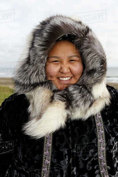 Portrait Of Yupik Eskimo Girl Wearing Traditional Fur Parka And Ruff