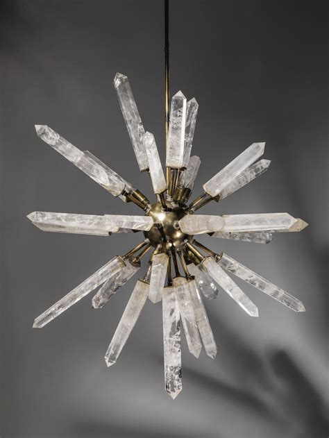 The chandelier chain links are silver plated, hanging from a french style. rock crystal and bronze 'starburst' chandelier | Crystal ...