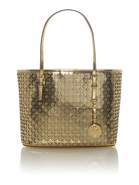 Michael Kors Flower Perforated Gold Small Tote Bag In Gold Lyst