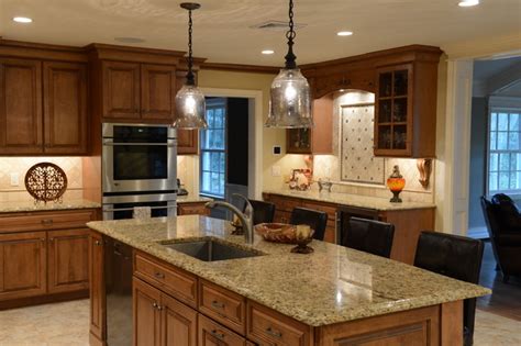 The process is slow and the cabinets will stink for a month or more as the varnish cures. Beautiful maple with a stain glaze finish, Italian granite & porcelain tile back - Traditional ...
