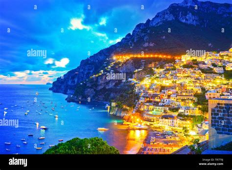 View Of Positano Village Along Amalfi Coast In Italy At Night Stock