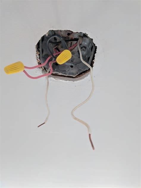 The only way to do this is by checking the voltage (110v/120v) between the white wire and the hot wire in the box. Light Fixture with two white wires - DoItYourself.com ...