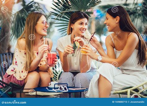 Girls Drinking Cocktail In Cafe And Having Fun Stock Image Image Of Clothes Coffee 169880715