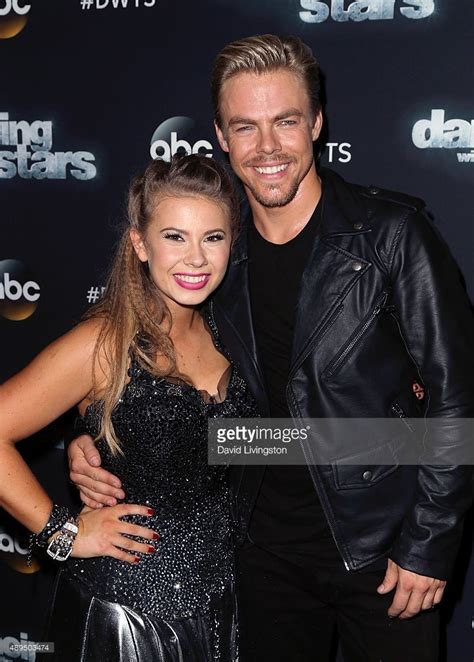 Two People Posing Together On The Red Carpet At Dancing With Stars