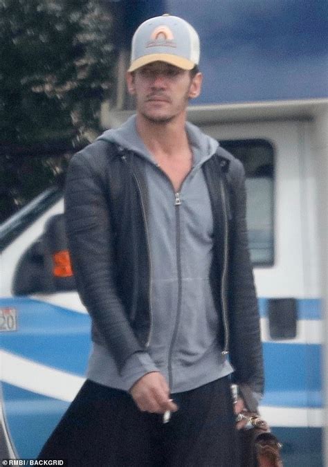 Jonathan Rhys Meyers Puffs On A Cigarette As He Steps Out Amid Claims