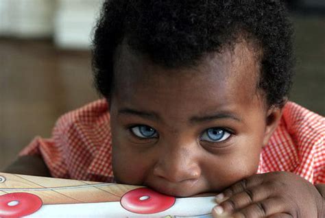 Black Baby With Blue Eyes Right Shot In The Right Time
