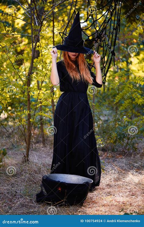 Witch Hiding Behind Black Hat Mysterious Ginger Witch Girl On A Forest